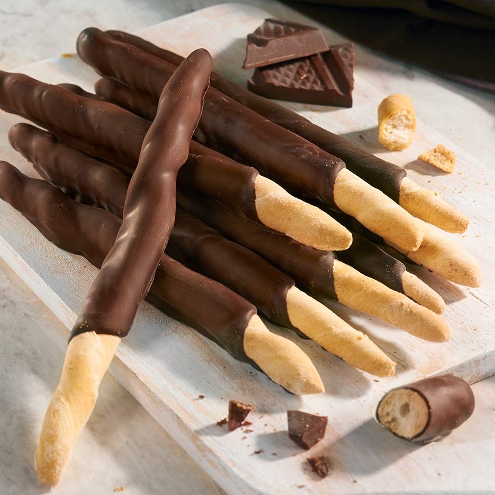 Grissini mit Schokolade überzogen