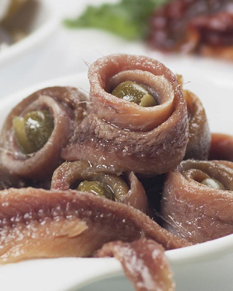 Gerollte Sardellenfilets - mit Kapern Gerollte Sardellenfilets - mit Kapern